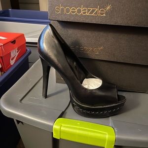 New, never been worn black peep toe pumps